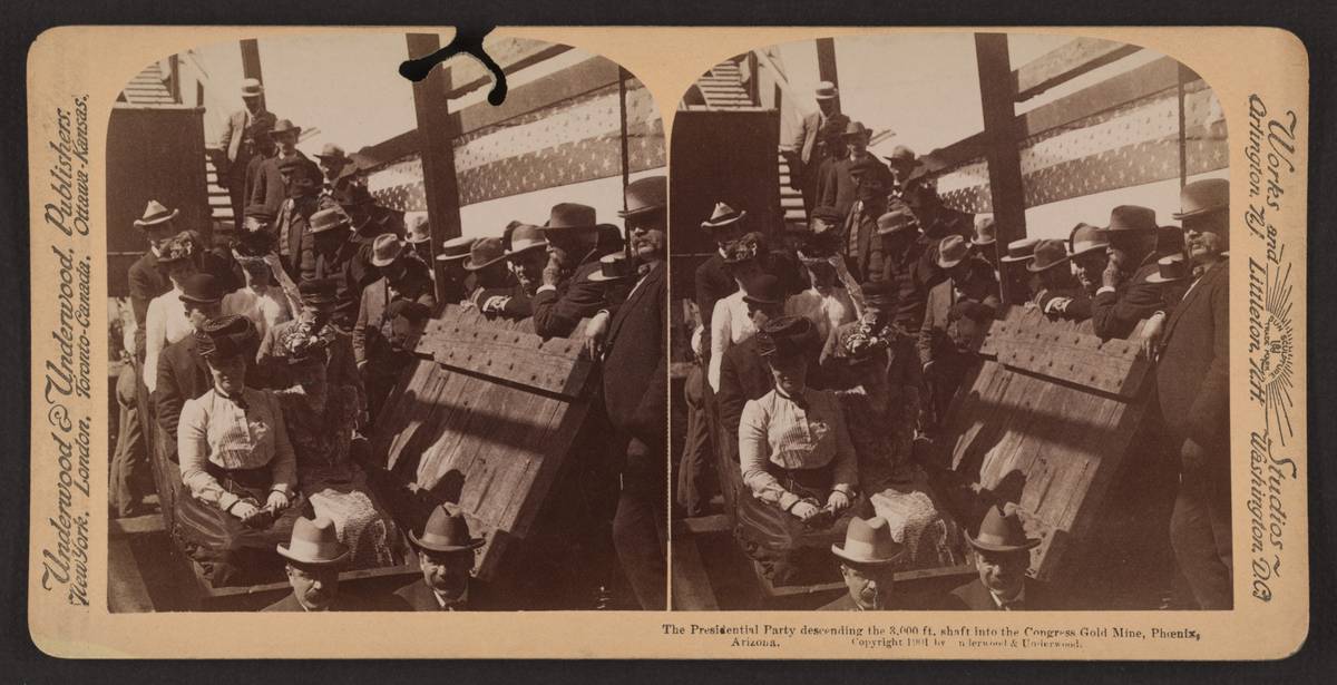 The presidential party descending the 3,000 ft. shaft into the Congress Gold Mine, Phoenix, Arizona (stereograph)