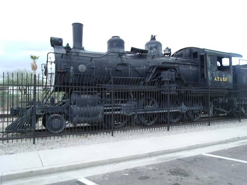 This locomotive was built around 1890 for the Atchison, Topeaka and Santa Fe Railroad. It is a Class 759, 2-8-0. When active, it was used on the main line between Chicago and the west. Engine 761 is located next to the historic Wickenburg train depot